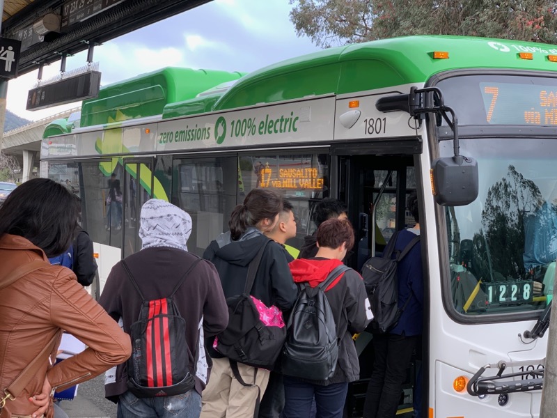 Students boarding Bus - BYD Electric